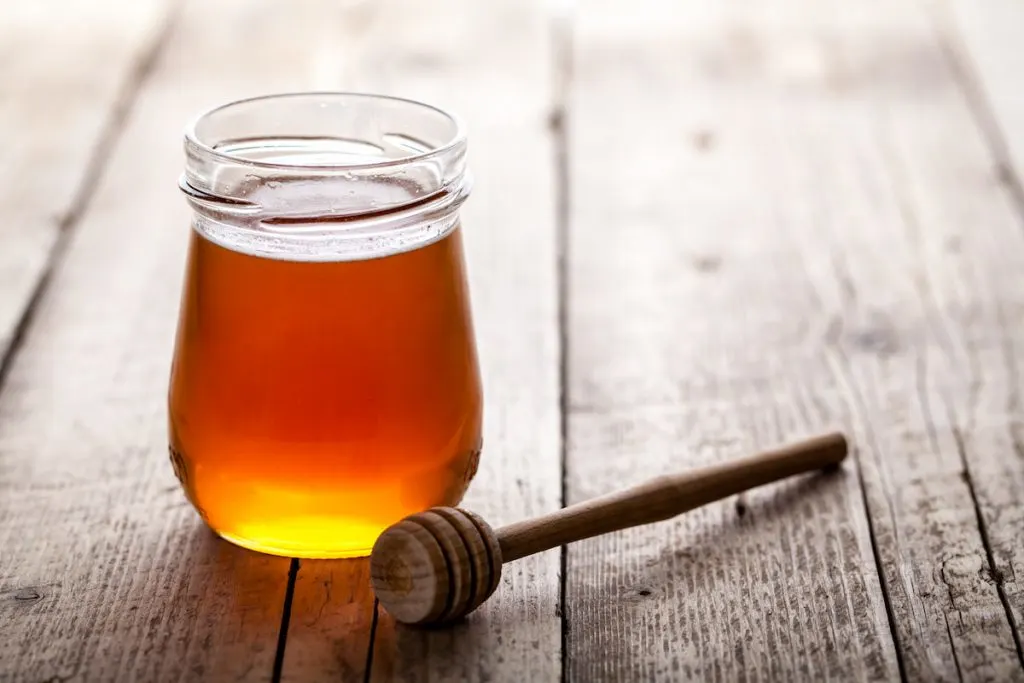 Jar of Honey with Honey Dipper