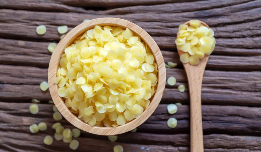 pure organic yellow beeswax pellets for homemade natural beauty and D.I.Y. project.